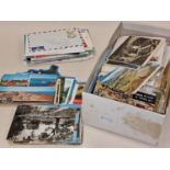 A box of various postcards. Assorted ages.