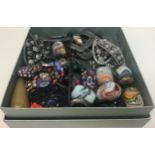 A box containing antique shoe buckles, trade beads and miscellaneous items.