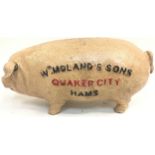 A Moorlands cast advertising pig.