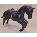 Vintage 1950's leather model of a horse 42cm in length.
