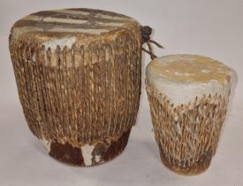 Two vintage ethnic bongo drums.