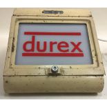 Vintage light box with Durex applied advertising logo.