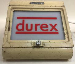 Vintage light box with Durex applied advertising logo.