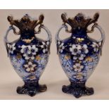 Pair of large ceramic French style blue and white twin handled vases each 43cm tall.