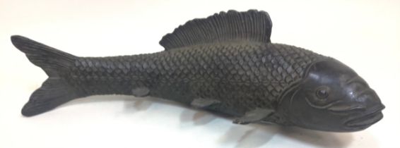 A bronze model of a carp 30cm in length.