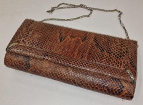 Ladies designer Snake skin clutch handbag