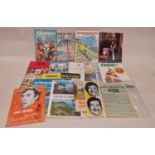 Collection of vintage tourist guides to include local examples together with antique book pages,