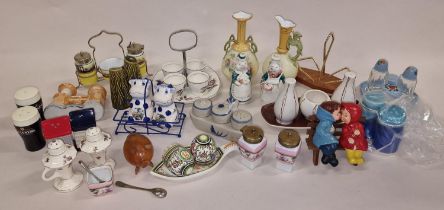 A large collection of mainly cruet sets, some novelty. Various makes and designs.