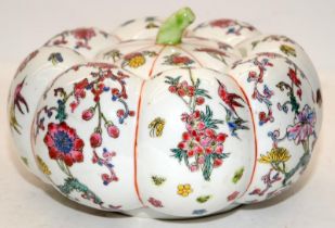 Large antique Oriental Famille Rose pumpkin shaped lidded storage jar decorated with flowers and