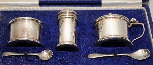 Silver H/M boxed cruet set with liners