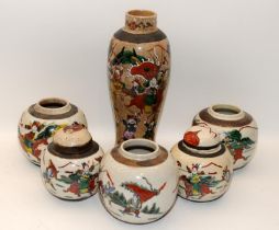 Five Chinese crackled glaze jars, two covers and a tall vase.