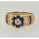 18ct gold ladies Diamond and sapphire statement ring size O