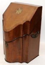 George III knife box in serpentine form, with an inlaid star motif to lid. Hinged top with fitted