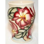 Moorcroft 13cms tall vase in the Frangipani design by Emma Bossums,