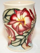 Moorcroft 13cms tall vase in the Frangipani design by Emma Bossums,