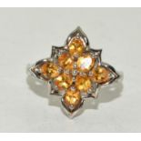A 925 silver and citrine flower ring Size R 1/2.