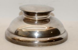 Large sterling silver capstan inkwell Hallmarked for Birmingham 1950. 1956 dated inscription to lid.