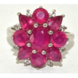 A huge 925 silver rubalite and CZ flower ring, Size S