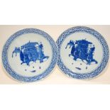 A pair of late 19th century Chinese blue & white plates decorated scholars, D24cm