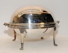 Large silver plated muffin server with domed lid on claw feet. With presentation engraving dated