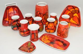 A collection of Poole Pottery Delphis vases and pin trays including examples by Carol Cutler. 14