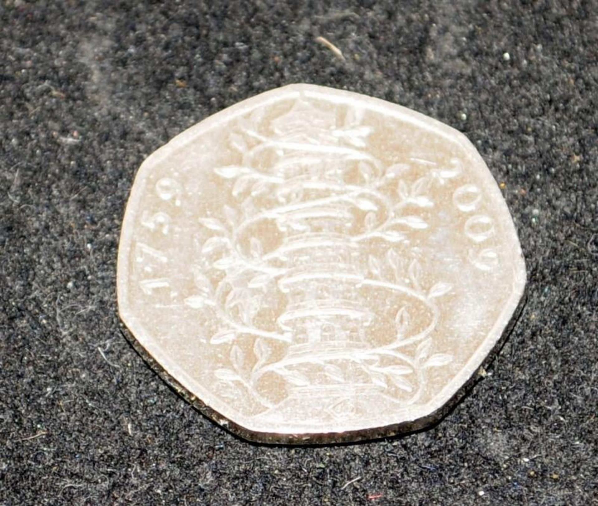 A rare 2009 Kew Gardens 50 pence c/w ten more 50p's to include Beatrix Potter and 2012 Olympics