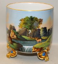 Large antique continental porcelain bowl on three gilded feet with hand painted forest scenes. 23cms