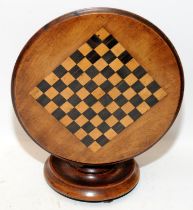 Victorian apprentice piece mahogany tilt top circular table with inlaid checkerboard top on a