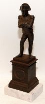 Spelter cast of Napoleon standing on a marble base 25cm tall