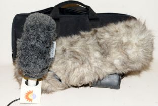 From a professional filming environment: Rycote windjammer pistol mic c/w a Rycote Softie