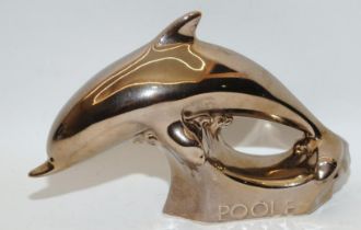 Poole Pottery advertising gold Dolphin.