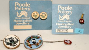 Poole Pottery stoneware jewellery circa 1980's, a small collection of five items, slip decorated