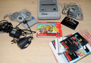 Vintage Nintendo SNES console c/w controllers and games including boxed Super Mariocart
