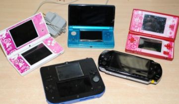 Collection of Nintendo 2DS, 3DS and PSP handheld consoles