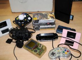 A collection of handheld games consoles to include DS and PSP