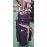 Golf clubs with Nike golf bag. (1)