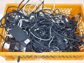A large crate of power cables/laptop adaptors.