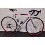 B H light weight 9 speed racing bike with Daytona brakes and gears 21" frame size 27" wheel size.