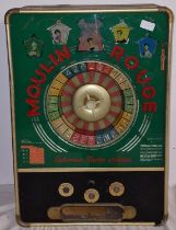 Moulin rouge looks complete coin operated roulette machine.