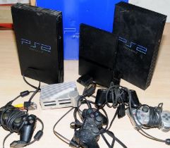 Carton of PS2 consoles and controllers etc.