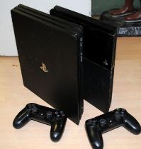 2 x PS4 consoles c/w 2 x controllers