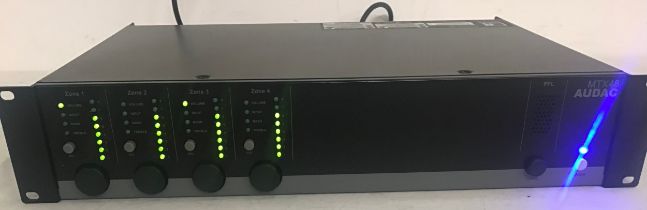 AUDAC MTX48 MULTI 4 ZONE MATRIX AMPLIFIER. This unit powers up fine and has rack mount ears and is
