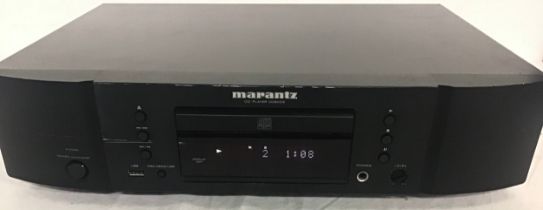 MARANTZ CD PLAYER. This is model number CD 6003 and powers up and plays when plugged in. Their is no