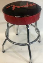 FENDER STOOL. Nice item for the guitarist or drummer in the family. Finished in black and red