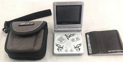 NINTENDO GAME BOY ADVANCE SP. This handheld gaming system is a foldable version of the GBA and is