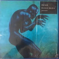 SEAL “HUMAN BEING” VINYL LP RECORD. A Warner Brothers Record 1-46828 released in 1998 and is found