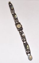 Ladies Arts and Crafts Silver and moonstone bracelet in the Liberty style marked London 1903