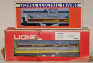 Lionel trains "Erie GP-9" Lackwanna locomotive together a Erie Lackwanna extended caboose carriage