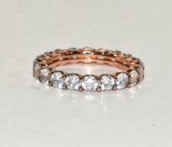 A rose gold on 925 silver CZ eternity band, Size J