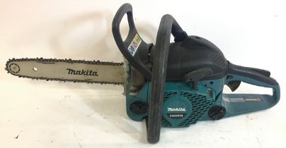 Makita petrol chainsaw model No. EA3201S.